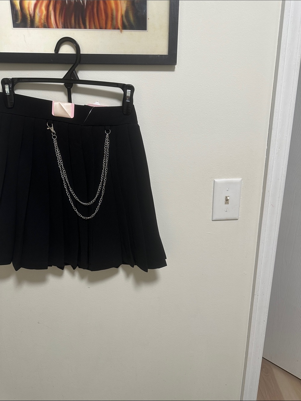 Black Pleated Mini Skirt with Chain Detail